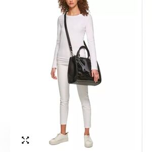 Modern and sophisticated Clear/Black Sophia Tote by Calvin Klein.